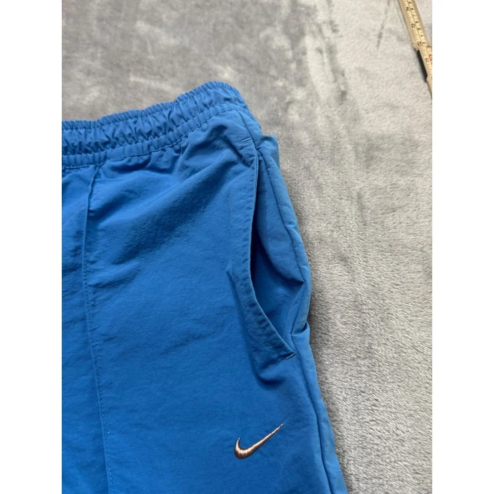 Nike Womens XL Everything Wovens Mid Rise Pants Star Blue Open Hem Baggy